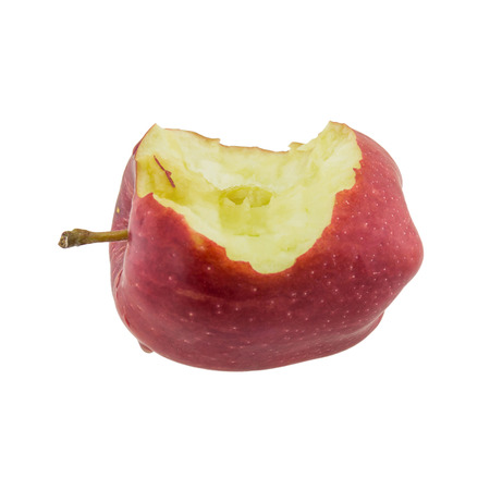 Red apple with missing a bite isolated on white backgroundの写真素材