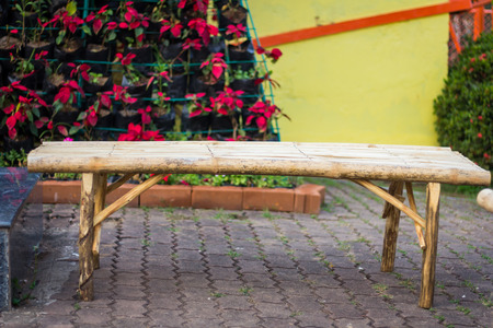 Bamboo bench in gardenの写真素材