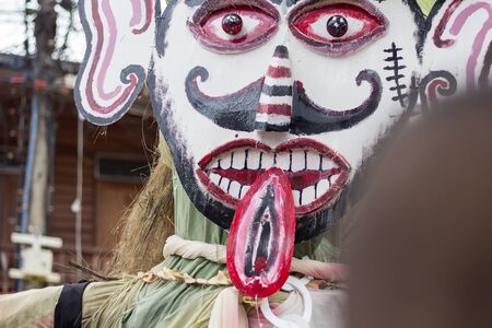 LOEI,THAILAND-JULY 6,2019 : Phi Ta Khon festival, Phi Ta Khon masks and masks international, dance to show Phi Ta Khon  festival in rainy season on july 6 ,2019 in Loei province of Thailand