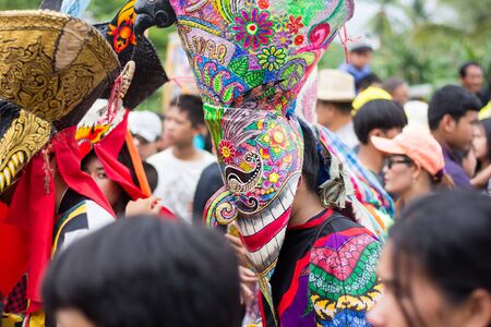 LOEI,THAILAND-JULY 6,2019 : Phi Ta Khon festival, Phi Ta Khon masks and masks international, dance to show Phi Ta Khon  festival in rainy season on july 6 ,2019 in Loei province of Thailand