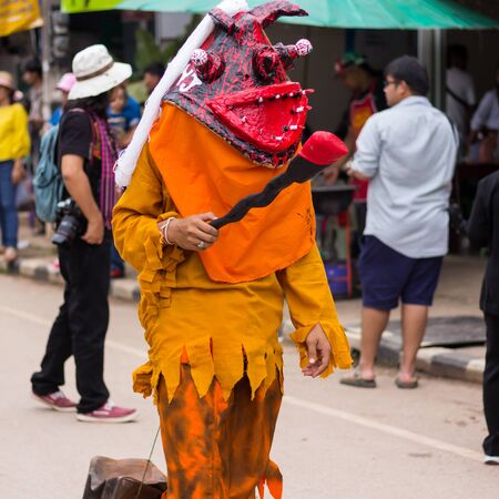 LOEI,THAILAND-JULY 6,2019 : Phi Ta Khon festival, Phi Ta Khon masks and masks international, dance to show Phi Ta Khon  festival in rainy season on july 6 ,2019 in Loei province of Thailand