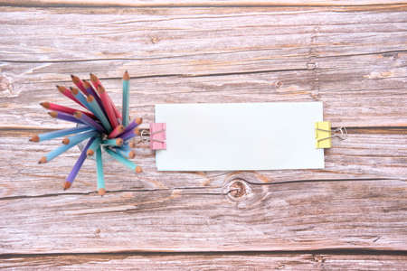 School item and office supplies on table background and space for text