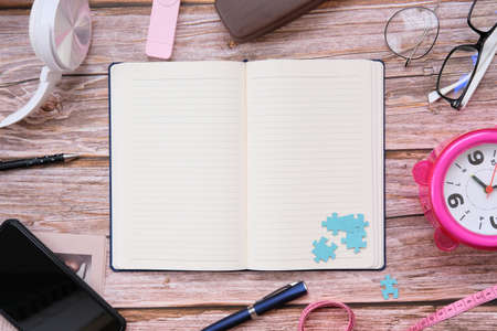 Desk office workspace for text, smartphone and other work supplies with cup of coffee. Top view with copy space for input the textの写真素材