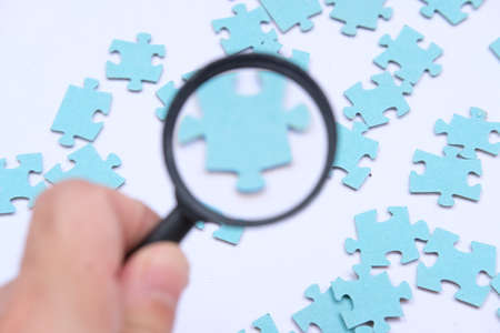 Close up Jigsaw puzzle. Business solutions, success and strategy concept. Businessman concept. jigsaw backgroundの写真素材