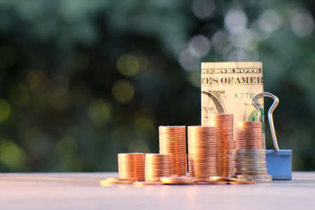 coin on table background and business or finance saving moneyの写真素材