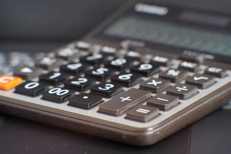 close up calculator on table and business conceptの写真素材