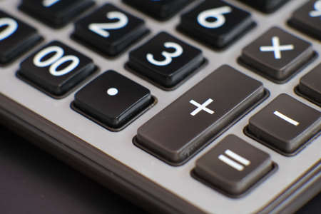 close up calculator on table and business conceptの写真素材