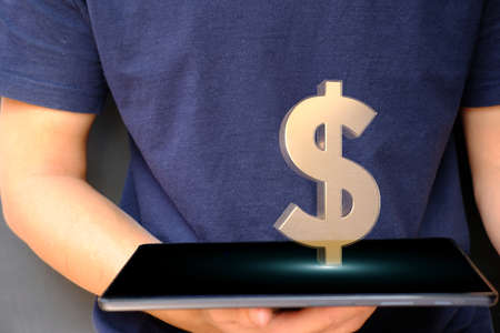A man holds a tablet with a golden dollar sign on the screen.