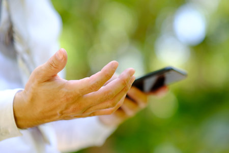 businessman using a smartphone and technology network concepts