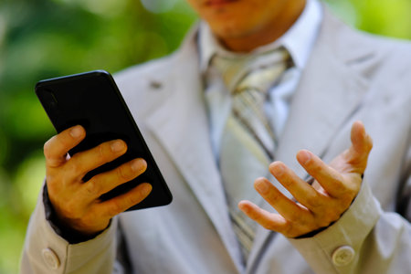 businessman using a smartphone and technology network conceptsの写真素材