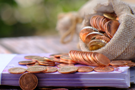 stacks of coin on table background and concept saving money, business growth strategy of money...