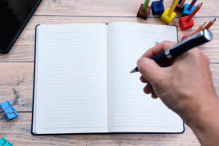 White paper and pencil on the table background and space