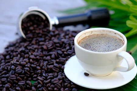 coffee cup on table background and coffee in the morningの写真素材