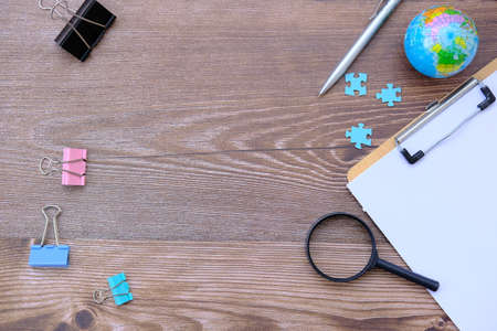 Notebook and pen on a desk in an office and office equipment conceptの写真素材