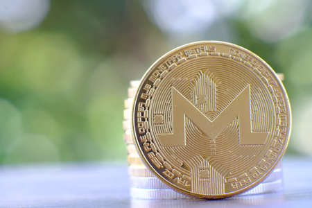 Physical version of Monero coin. Digital currency. Cryptocurrency.の写真素材