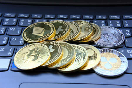 cryptocurrency coins on table and digital currency money concept,crypto-currency Market,...