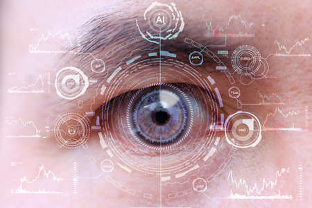 Close-up of a man's eye with high tech HUD interfaceの写真素材