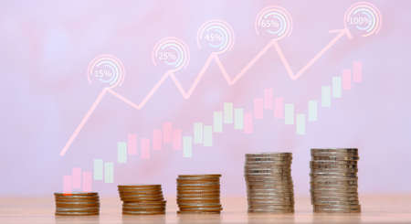 Saving money concept, stacking coins, advertising coins of finance and banking, Financial stock market graph and rows of coins growth, abstract and symbol for finance concept, business investmentの写真素材