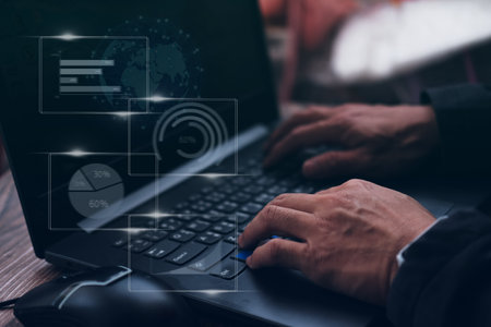 Businessman working on data analytics process management with financial charts and graph and...