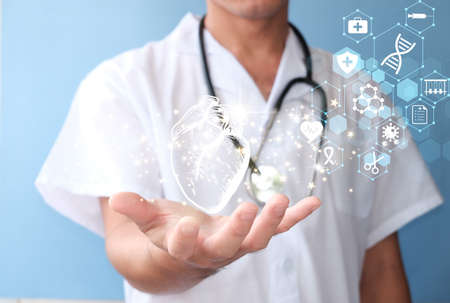 Health care and medical services concept. Doctor hand working with modern computer interface as medical network conceptの写真素材