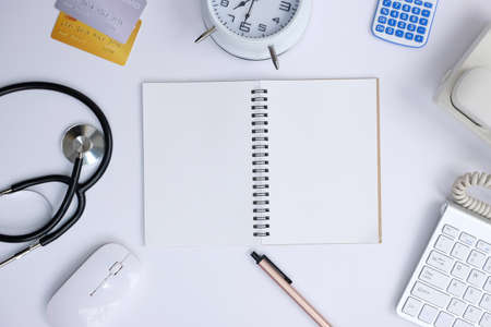Computer keyboard, mouse, notebook and calculator on white background.の写真素材