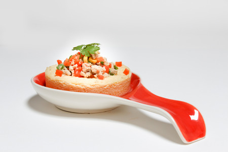 Steamed eggs with pork , tomato , corn , and Vegetable in dish on white blackground (Thai name is Kai thoon).の写真素材