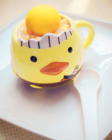 baby food whit egg on dishの写真素材