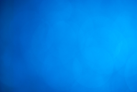 blue glitter vintage lights background,bokeh background,defocusedの写真素材