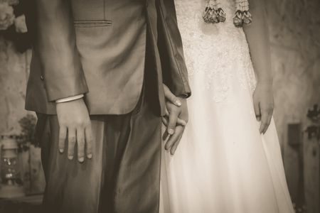 Two hands holding together.の写真素材