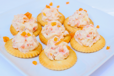 Tasty crackers with cream cheese,carrot.Healthy snacks.の写真素材