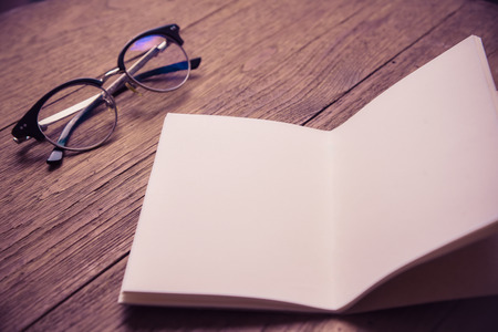 Top view of notebook pape on Office desk table.の写真素材