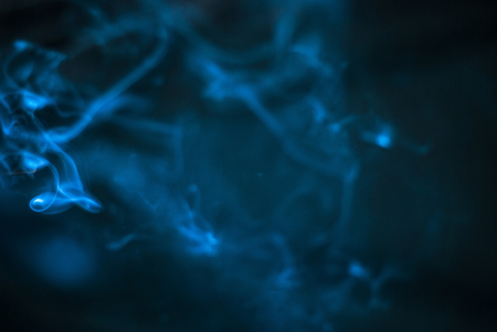 blue Smoke on black background , beautiful smoke,Fluffy Puffs of Smoke.の写真素材