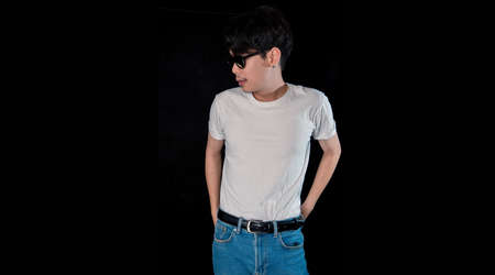 Portrait of men with sunglasses standing looking aside dramatic  on dark studio background , asianの写真素材