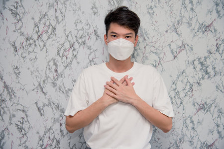 man showing gesture "stop" isolated on White background,pandemic and social distancing concept.Covid-19の写真素材