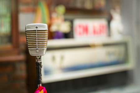 Old microphone, multicolored tape in the recording room.の写真素材