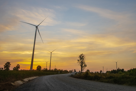 Turbine field at sunsetの写真素材