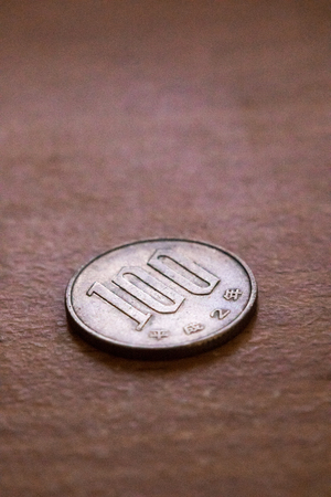 Coin of japan on old woodの写真素材