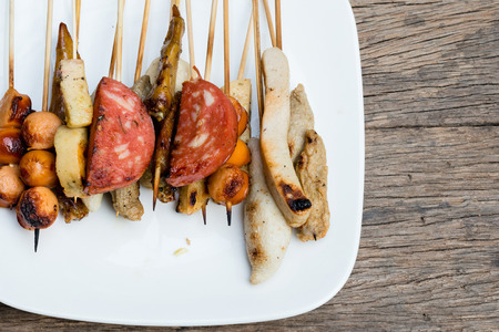 Grilled meatballs sold in the pedestrian street market in Thailandの写真素材