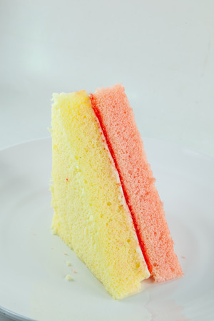 vanilla and strawberry chiffon cake flavor   on white の写真素材