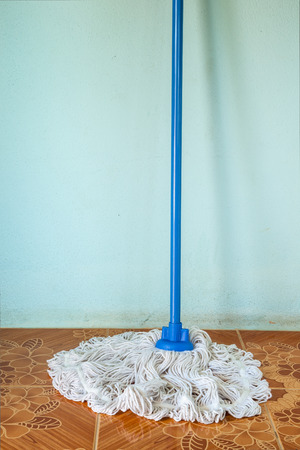 dolly cotton mop cleaning the floor marbleの写真素材