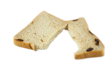 white bread with raisin  on white backgroundの写真素材