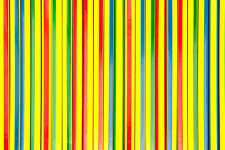 colored pencils in a row backgroundの写真素材