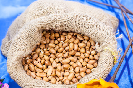 Heap of raw peanuts the sack bagの写真素材