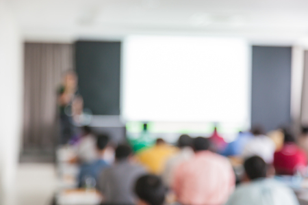 Abstract blurred people lecture in seminar roomの写真素材