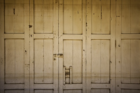 The old vintage grungy door of the white color background.の写真素材