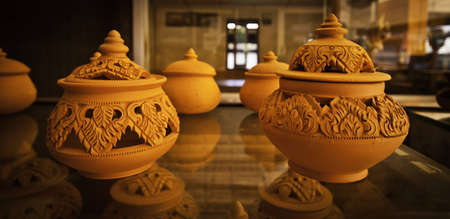 Thai traditional orange mudstone and clay pottery.