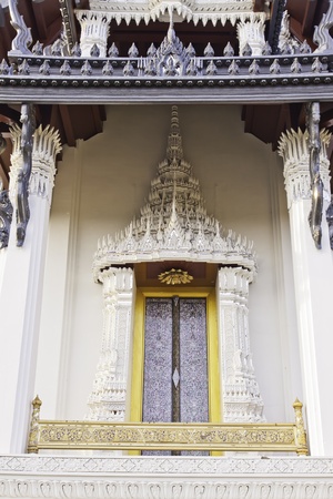 The white temple door decoration details of traditional Thai style architecture and interior design in landscape.の写真素材
