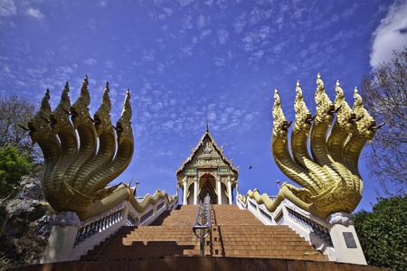 The King of Nagas statue is located in front of the Ubosot architecture of Khaokalok temple in...