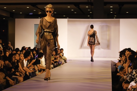 BANGKOK - MAY 2 : A model wears clothes by Thai fashion students at the fashion design contest and end-year fashion show on May 2 2012 at Central World Plaza Bangkok Thailand. Accademia Italiana Bangkok Campus teams up with f.fashion to organize this evenのeditorial素材