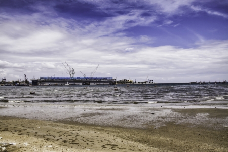 The beautiful natural landscape of the seashore and seaport.